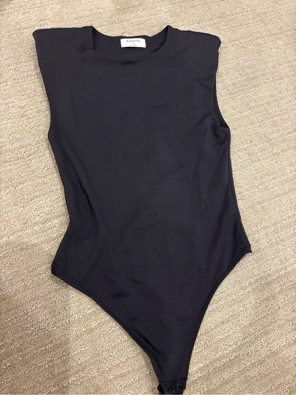 Babaton Black Sleeveless Padded-Shoulder Bodysuit